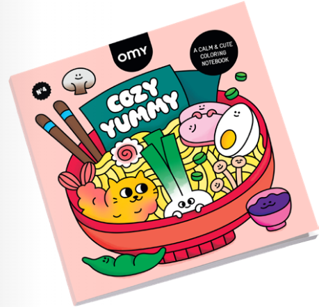 Coloring notebook titled 'Cozy Yummy' by OMY with cartoon food illustrations on a pink background.