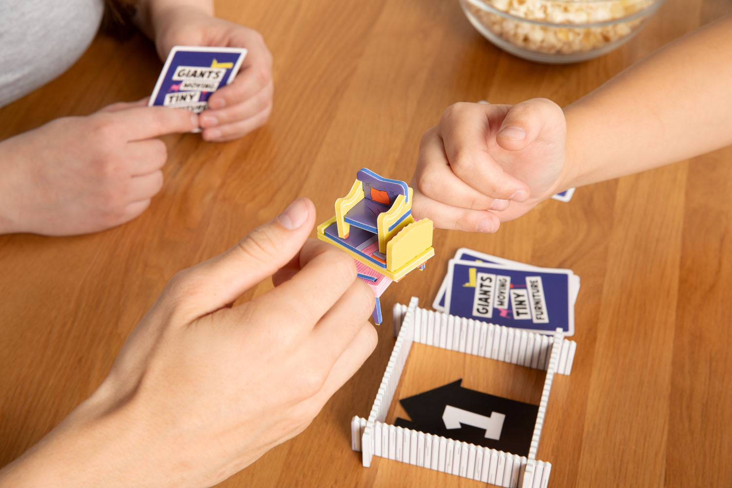 GIANTS MOVING TINY FURNITURE GAME