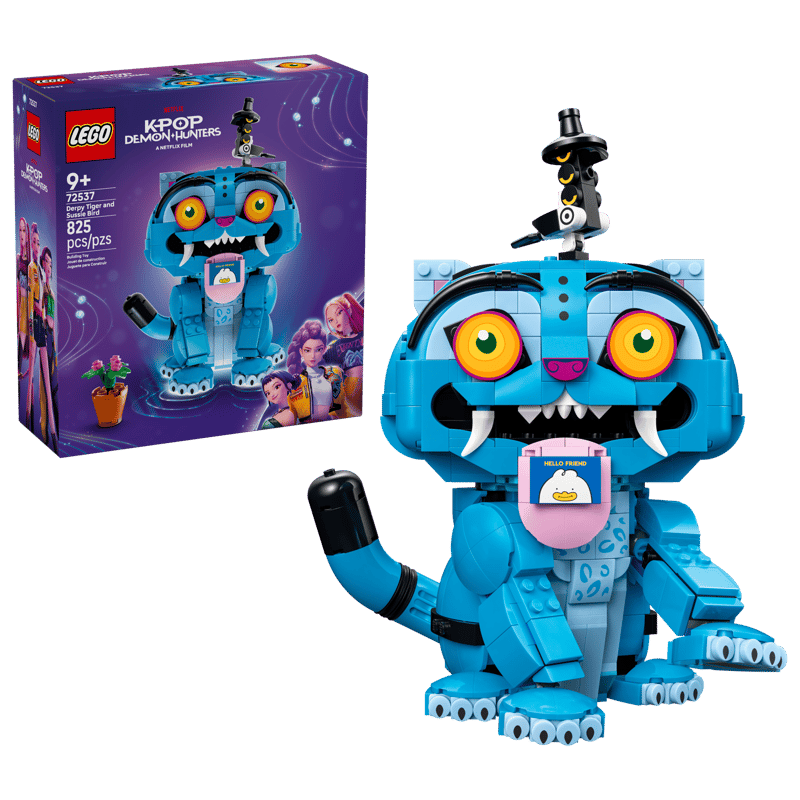 Blue toy figure with large eyes and a LEGO box in the background