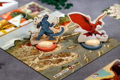Board game pieces with characters on a map