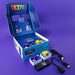 Tetris-themed 2-player plug and play console with accessories on a purple background