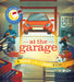 Book cover of 'At the Garage' with a garage scene and tools.