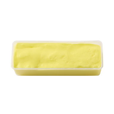 Block of yellow butter in a plastic container on a white background