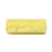 Block of yellow butter in a plastic container on a white background