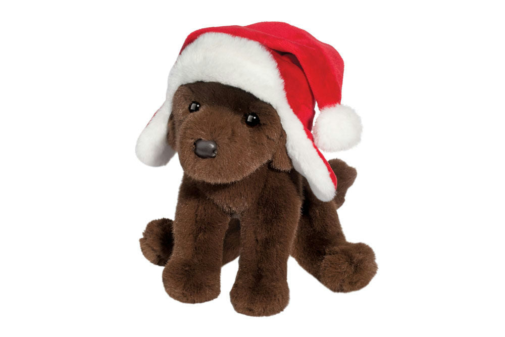 Plush dog toy wearing a Santa hat on a white background