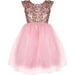 A girls' party dress with a sparkling rose gold sequined bodice and a fluffy light pink tulle skirt decorated with white starburst patterns.