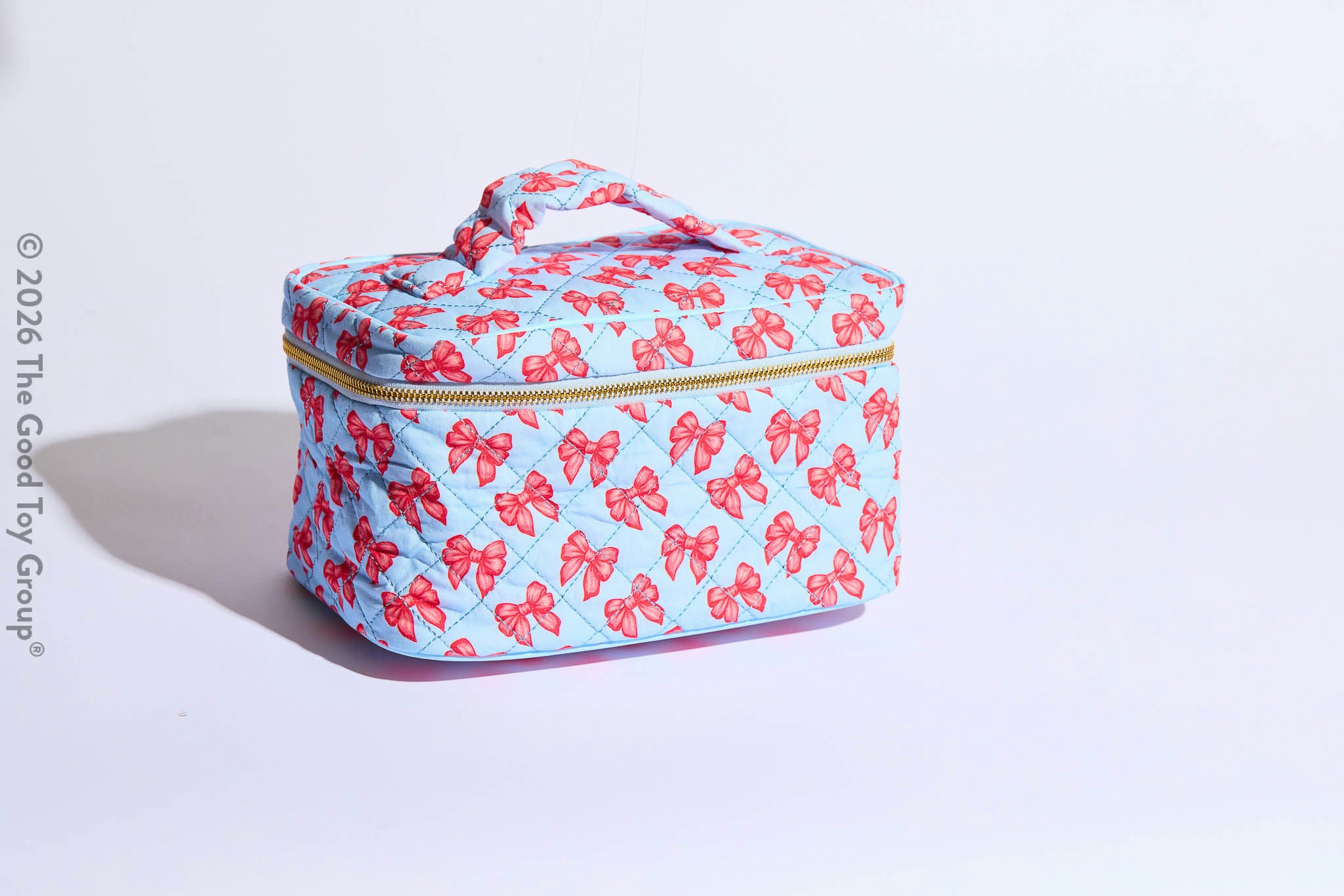 QUILTED MAKEUP BAG BLUE W/ BOWS KARMA