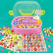 A colorful bead and craft kit with a pink plastic organizer case, yellow lid, and assorted beads, cords, and decorative pieces arranged on a bright teal background.