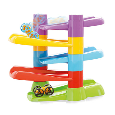 Colorful toy marble run with a car on a white background