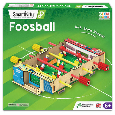 Smartivity Foosball DIY craft kit box, featuring a green background with an illustration of the assembled wooden foosball table in the center.