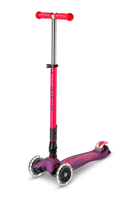 Pink and purple scooter on a white background
