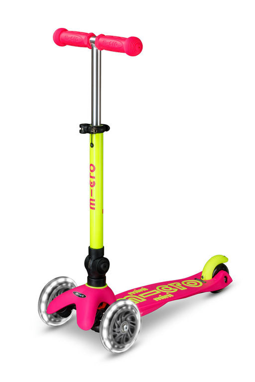 Pink and yellow scooter with a white background