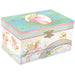 A decorative unicorn-themed jewelry box with a pastel multicolor design, featuring gold foil stars, winged unicorns, a rainbow, and the words 'be magical' on a white background.