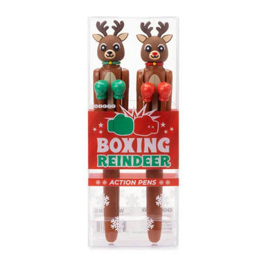 A pair of novelty boxing action pens shaped like brown reindeer with green and red boxing gloves, packaged in a clear plastic case with a red 'BOXING REINDEER ACTION PENS' label.
