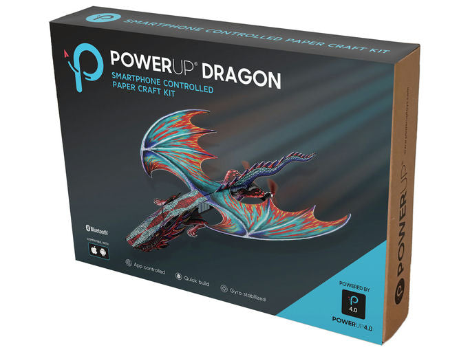 PowerUp Dragon smartphone controlled paper craft kit box, featuring a 3D dragon model on the front cover, with a dark gray and blue design and brown side panels.