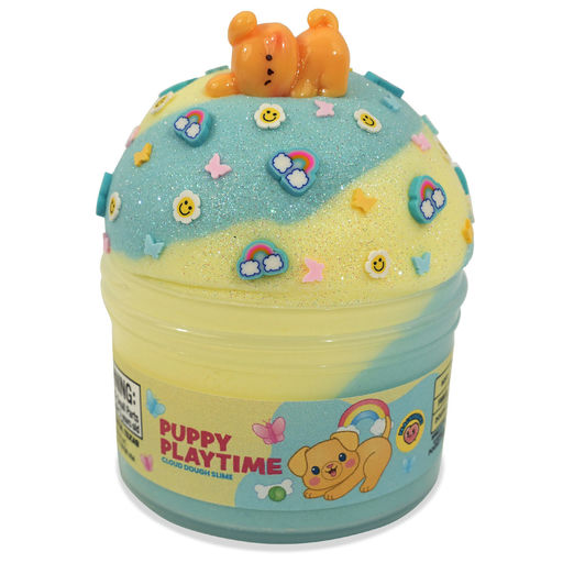 A round container of 'Puppy Playtime' glow-in-the-dark slime with a matching glittery lid decorated with a small orange puppy figure, rainbows, stars, and smiley faces.