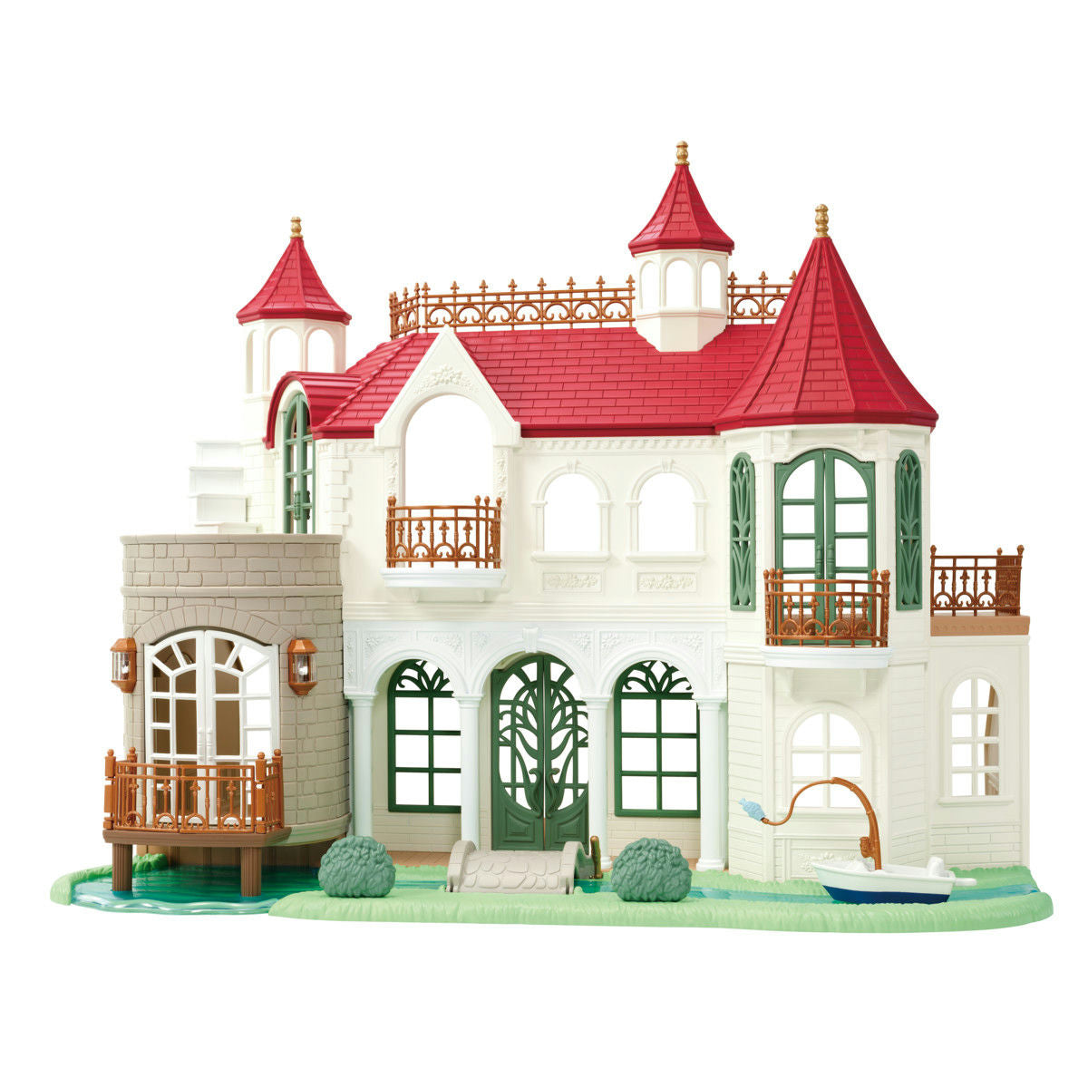 Toy model of a detailed house with red roofs and wooden balconies on a white background