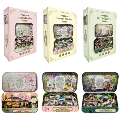 Six decorative boxed craft kits and their opened contents arranged in two rows on a white background. The top row shows pastel packaging for Sakura Station, Dream Market, and Forest Retreat.