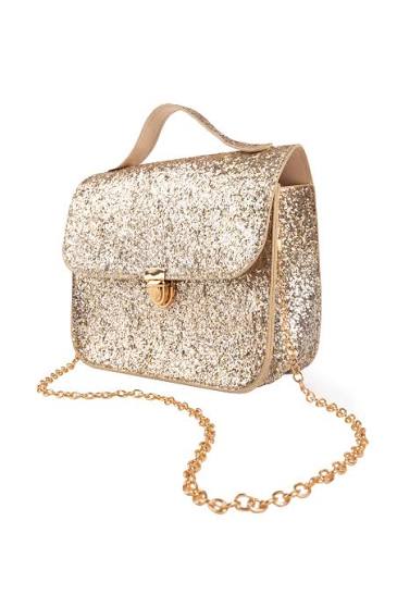 Gold glitter handbag with a chain strap on a white background