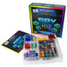 A toy electronics kit called 'Top Secret Snap Circuits Spy Kit' shown with its colorful retail box, instruction booklet, and a clear plastic tray containing various colorful electronic components and small circuit boards on a white background.