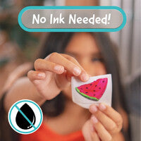 Person holding a watermelon-themed sticker with 'No Ink Needed!' text and symbol.