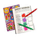A children's coloring/activity book titled 'Ghost Doodles' shown open with two colored pencils, alongside a matching sticker sheet. The product is photographed on a clean white background.