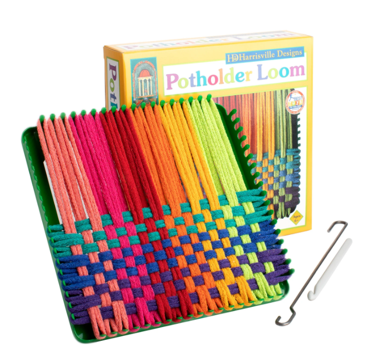 loom with cotton fabric and needle